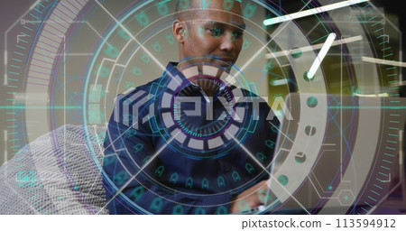 Image of biracial businessman working in office 113594912