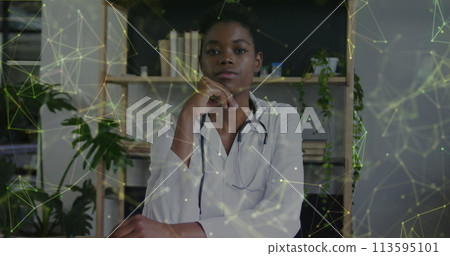 Image of data processing over african american female doctor Image of data processing over african american female doctor 113595101