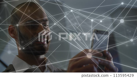 Image of network of connections over caucasian businessman using smartphone 113595429