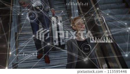 Image of network of connections over caucasian businessman reading flyer 113595446