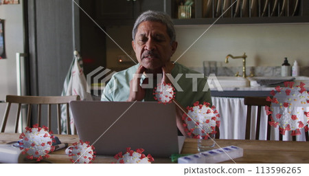 Image of covid 19 cells over sick senior man touching his neck with laptop at home Image of covid 19 cells over sick senior man touching his neck with laptop at home 113596265