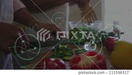 Image of networks of connections with icons over mid section of two people cooking Image of networks of connections with icons over mid section of two people cooking 113596317