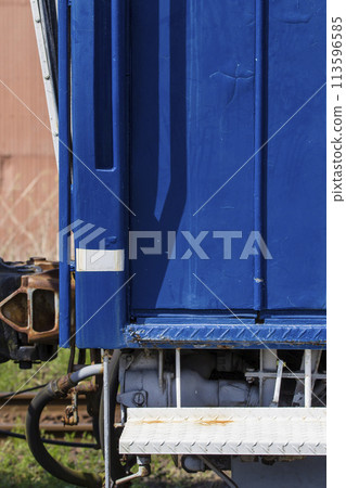 Pattern on the side of an old railroad car 113596585