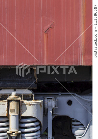 Pattern on the side of an old railroad car 113596587
