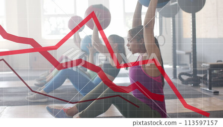 Image of graph processing data over diverse women cross training with medicine balls at gym 113597157