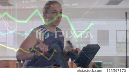Image of data on graph over caucasian woman cross training on elliptical at gym Image of data on graph over caucasian woman cross training on elliptical at gym 113597170