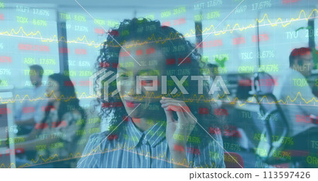 Image of interface showing data and statistics with business colleagues working in call centre 113597426