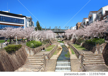 The station square and cherry blossom trees at the new Minoh Kayano Station on the newly opened Kita-Osaka Kyuko Railway The station square and cherry blossom trees at the new Minoh Kayano Station on the newly opened Kita-Osaka Kyuko Railway 113597494