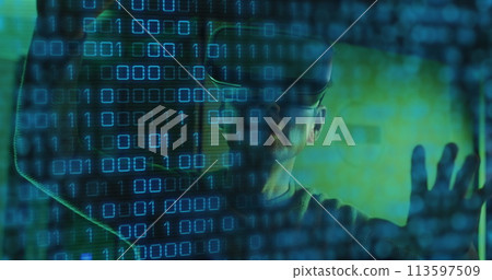 Image of binary coding data processing over asian male it engineer in vr headset 113597509