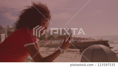 Image of data processing on screen over woman using smartphone Image of data processing on screen over woman using smartphone 113597535