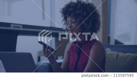 Image of 6g texts over african american woman using smartphone Image of 6g texts over african american woman using smartphone 113597595