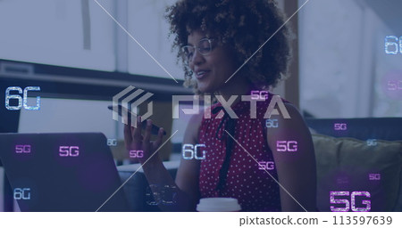 Image of 6g texts over african american woman using smartphone Image of 6g texts over african american woman using smartphone 113597639