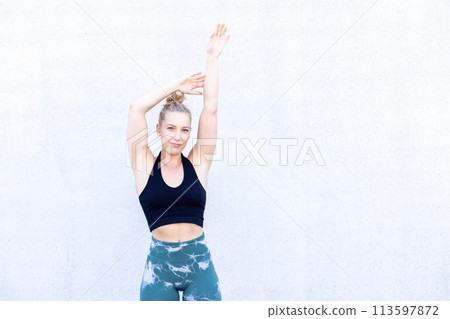 Healthy Sports Woman Stretching Before Workout 113597872