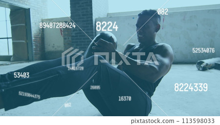 Multiple changing numbers against african american man working out with medicine ball in the gym Multiple changing numbers against african american man working out with medicine ball in the gym 113598033