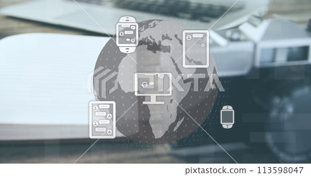 Image of communication icons and globe over laptop, notebook and camera 113598047