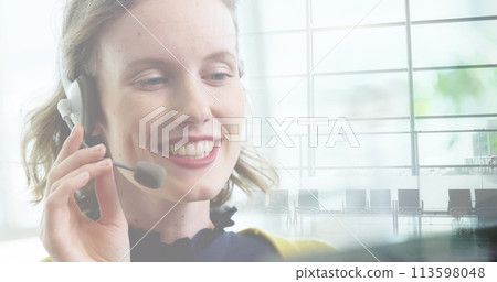 Image of caucasian businesswoman in office over people walking and cityscape 113598048