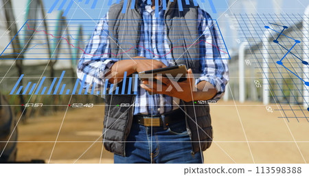 Image of data processing and statistics over biracial engineer using tablet 113598388
