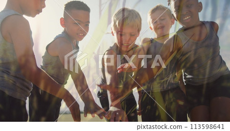 Image of sun and grasses over happy diverse schoolchildren stacking hands in outdoor sport class Image of sun and grasses over happy diverse schoolchildren stacking hands in outdoor sport class 113598641