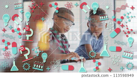 Image of science icons over happy african american schoolboys in chemistry class 113598949