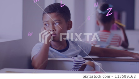 Image of letters over bored biracial schoolboy at desk in classroom Image of letters over bored biracial schoolboy at desk in classroom 113599168
