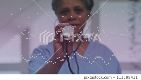 Image of spots over african american female doctor with stethoscope 113599411