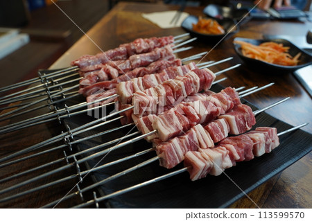 Fresh raw lamb skewers in restaurant Fresh raw lamb skewers in restaurant 113599570