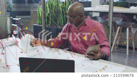 Image of data processing over african american businessman working in office Image of data processing over african american businessman working in office 113599678