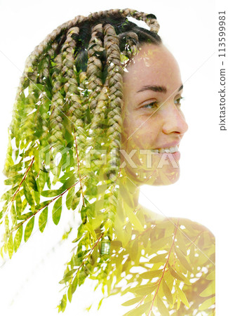 A double exposure portrait of a woman merged with a photo of green tree leaves. A double exposure portrait of a woman merged with a photo of green tree leaves. 113599981