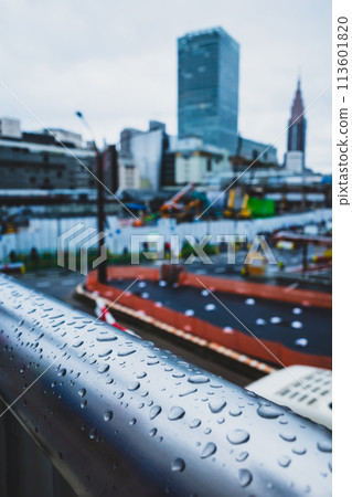 Raindrops on a pedestrian bridge West exit of Shinjuku Station, Tokyo, currently under redevelopment 2024.04 c-2 High saturation matte finish 113601820