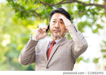 Businessman fresh green smartphone worried 113602443
