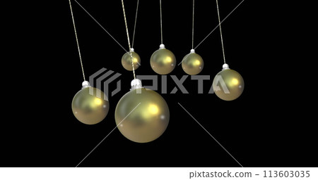 Image of christmas gold baubles dangling over black background 113603035