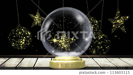 Image of christmas snow globe with snow falling and baubles on black background Image of christmas snow globe with snow falling and baubles on black background 113603115