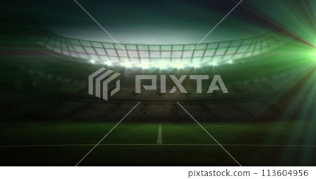 A stadium is illuminated under bright lights, with copy space A stadium is illuminated under bright lights, with copy space 113604956