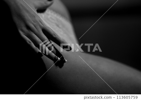 woman's hand on hip 113605759