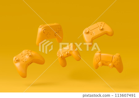 Set of flying gamer joysticks or gamepads on monochrome background 113607491