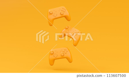 Video game joysticks or gamepads in plain monochrome yellow color background Video game joysticks or gamepads in plain monochrome yellow color background 113607500
