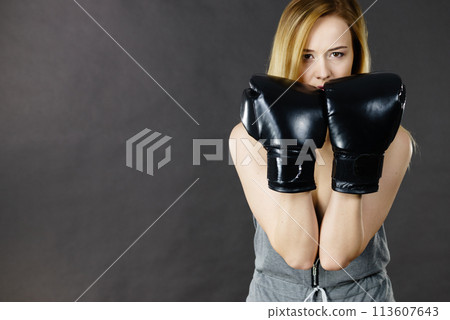 Boxer girl exercise with boxing gloves. Boxer girl exercise with boxing gloves. 113607643