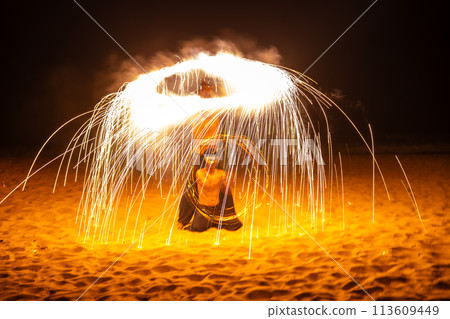 Fire show in Khao Lak beach in Phang Nga, Thailand 113609449