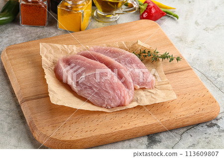 Raw turkey breast fillet steak 113609807