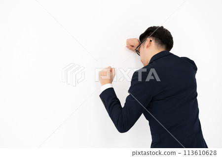 Middle-aged businessman worried about poor health Middle-aged businessman worried about poor health 113610628