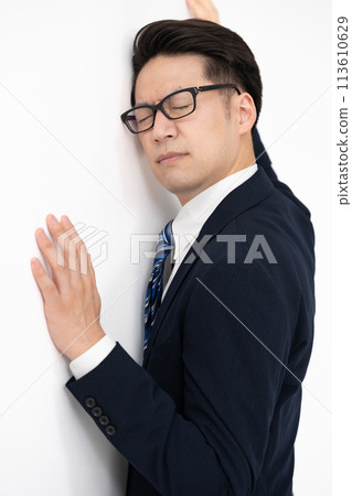 Businessman, middle-aged, feeling unwell, collapses Businessman, middle-aged, feeling unwell, collapses 113610629