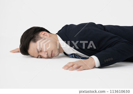 Businessman, middle-aged, feeling unwell, collapses 113610630