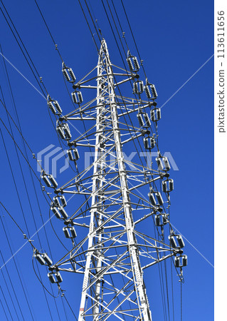 Japan's electric cityscape Japan's energy, light and shadow... Steel towers and countless power lines. Towards a new era of hope for tomorrow... 113611656