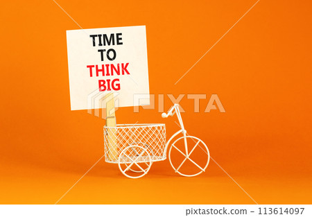 Time to think big symbol. Concept words Time to think big on beautiful white paper on clothespin. Bicycle model. Beautiful orange background. Business and time to think big concept. Copy space. Time to think big symbol. Concept words Time to think big on beautiful white paper on clothespin. Bicycle model. Beautiful orange background. Business and time to think big concept. Copy space. 113614097