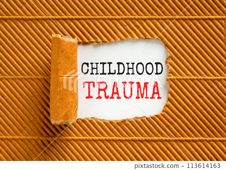 Childhood trauma symbol. Concept words Childhood trauma on beautiful white paper. Beautiful brown paper background. Business psychology childhood trauma concept. Copy space. Childhood trauma symbol. Concept words Childhood trauma on beautiful white paper. Beautiful brown paper background. Business psychology childhood trauma concept. Copy space. 113614163