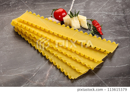 Uncooked raw Lasagna dry sheets Uncooked raw Lasagna dry sheets 113615379