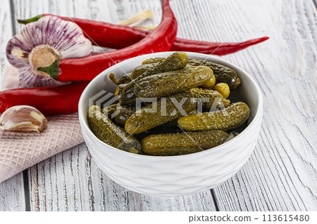 Marinated small cucumbers in the bowl Marinated small cucumbers in the bowl 113615480