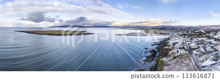 Aerial view of snow covered Portnoo in County Donegal, Ireland. 113616871