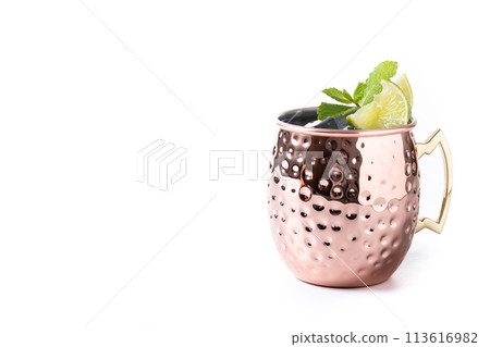 Moscow mule cocktail served with ice and slice of lime isolated on white background 113616982