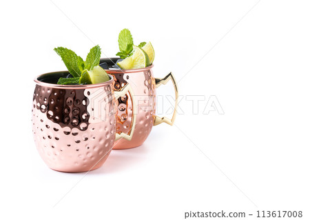 Moscow mule cocktail served with ice and slice of lime isolated on white background 113617008